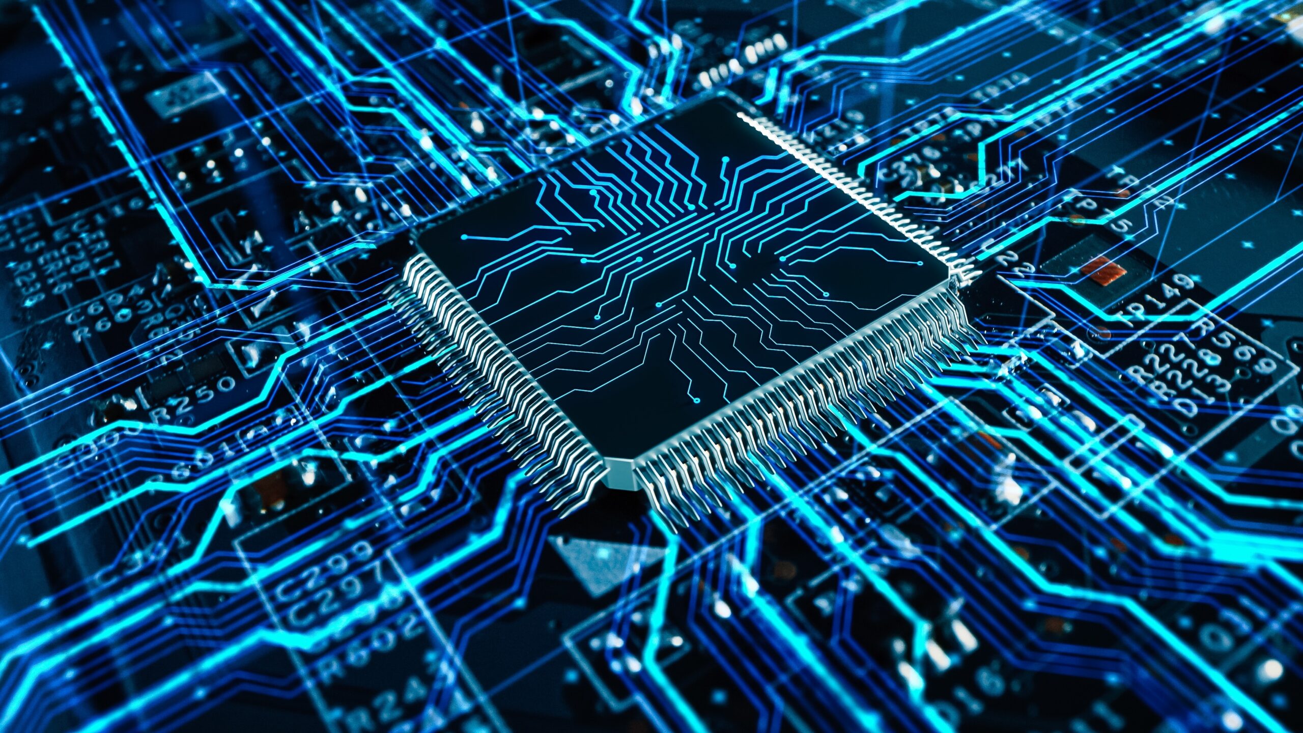 Close-up of a microchip on a circuit board, illuminated by blue electrical paths, highlighting the technology and complexity of electronic components.